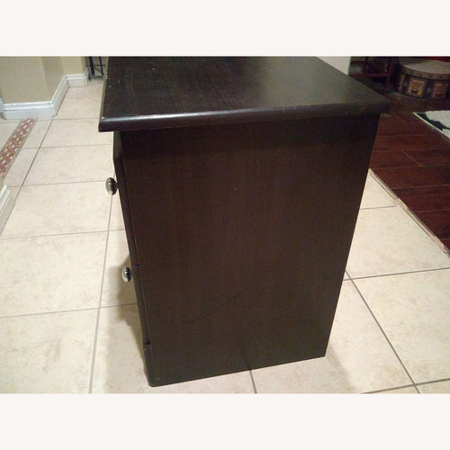 Used Dark Brown Wood Nightstand for sale on AptDeco