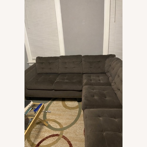 Used Raymour & Flanigan Dark Brown 3+ Piece Sectional for sale on AptDeco