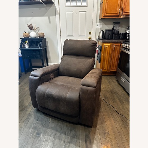 Used Ashley Furniture Dark Brown Leather Recliner for sale on AptDeco