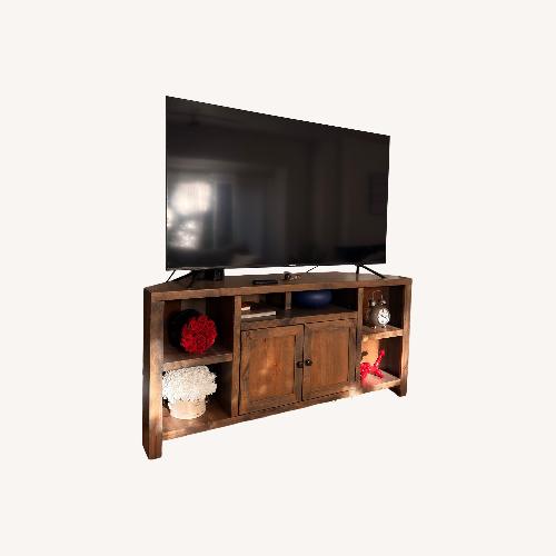 Used Living Spaces Dark Brown Wood Dresser for sale on AptDeco