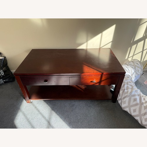 Used Wooden Coffee Table With 2-drawer Storage for sale on AptDeco