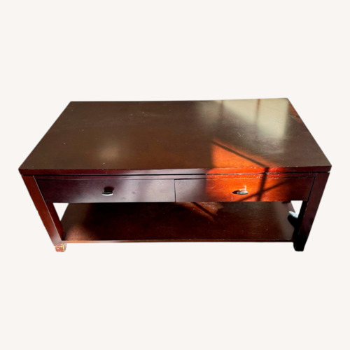 Used Wooden Coffee Table With 2-drawer Storage for sale on AptDeco