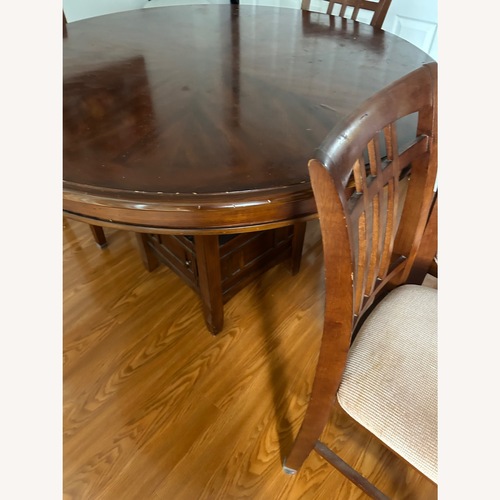 Used Huffman Koos Dining Set for sale on AptDeco