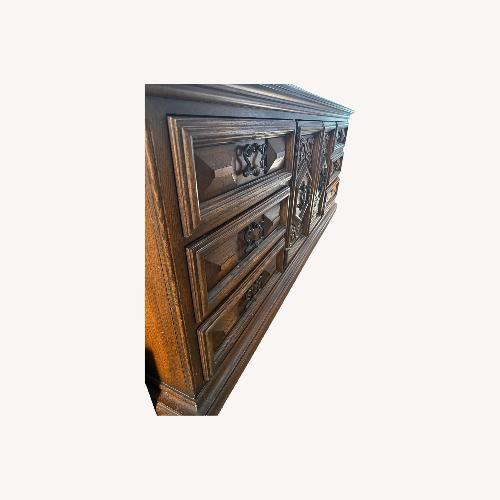 Used Dark Brown Wood Armoire for sale on AptDeco