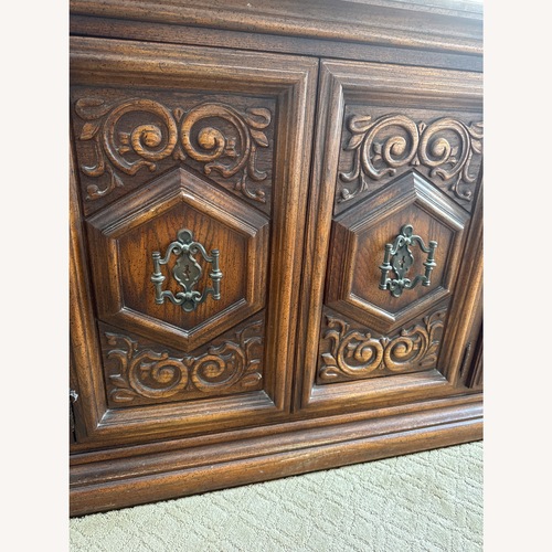 Used Dark Brown Wood Armoire for sale on AptDeco