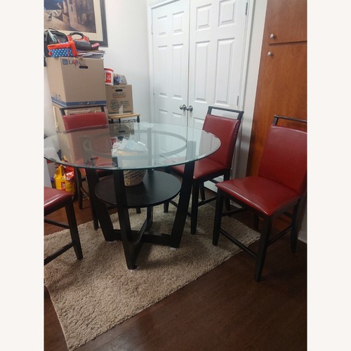 Used Ciara Dark Brown Glass Dining Chairs for sale on AptDeco