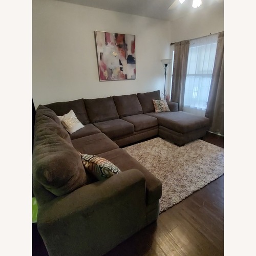 Used Rooms To Go Grey Sectional for sale on AptDeco