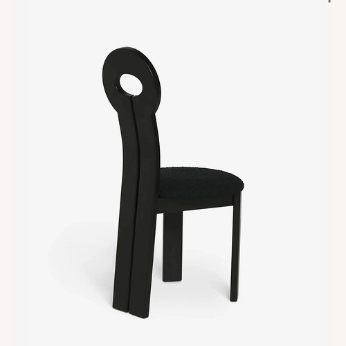Used Lulu & Georgia Black Wood Dining Chairs for sale on AptDeco