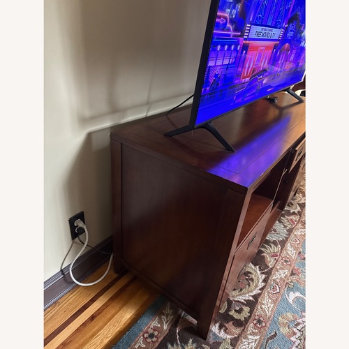 Used Raymour & Flanigan Natural Wood Media Storage for sale on AptDeco