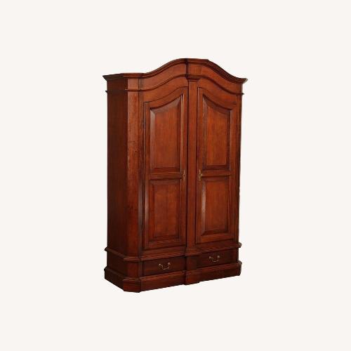 Used Vintage/Antique Dark Brown Wood Armoire for sale on AptDeco