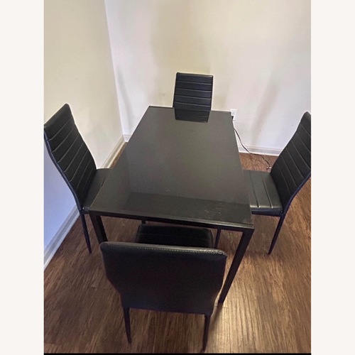 Used Entree Casual Dining Black Dining Table for sale on AptDeco