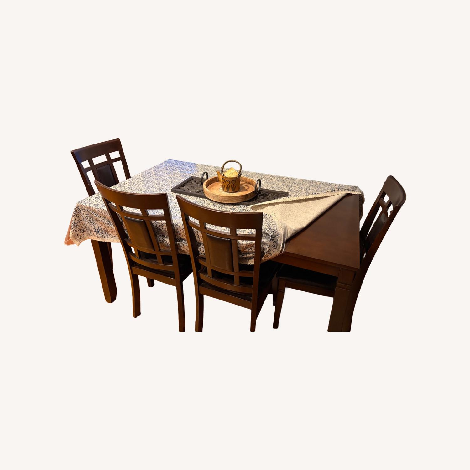 Bob's Discount Furniture Dark Brown Dining Table - image-0
