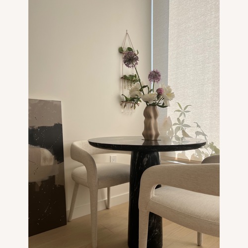 Used CB2 Babylon Black Marble Dining Table for sale on AptDeco