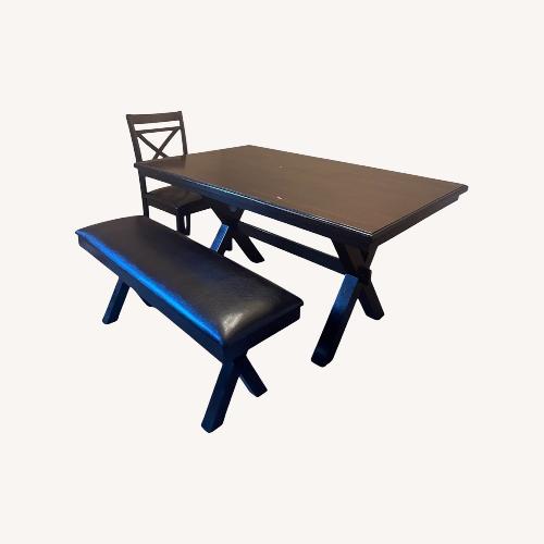 Used Dark Brown Dining Table for sale on AptDeco
