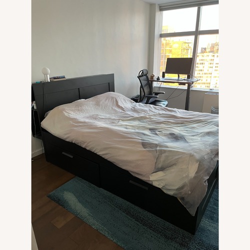 Used IKEA Brimnes Black Queen Bed for sale on AptDeco