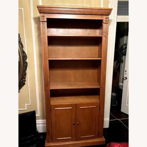 Used Gothic Cabinet Craft Light Brown Wood Bookcase for sale on AptDeco