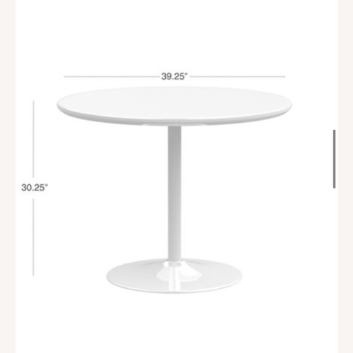 Used CB2 Odyssey White Metal Dining Table for sale on AptDeco