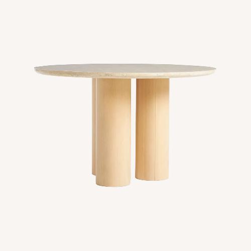 Used Anthropologie Anya Travertine Dining Table for sale on AptDeco