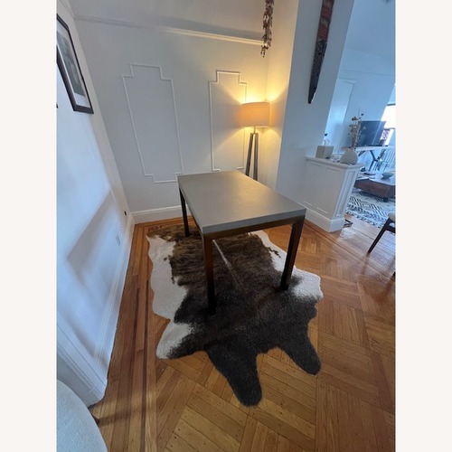 Used Overstock Cowhide Area Rug 5' x 6.8' for sale on AptDeco