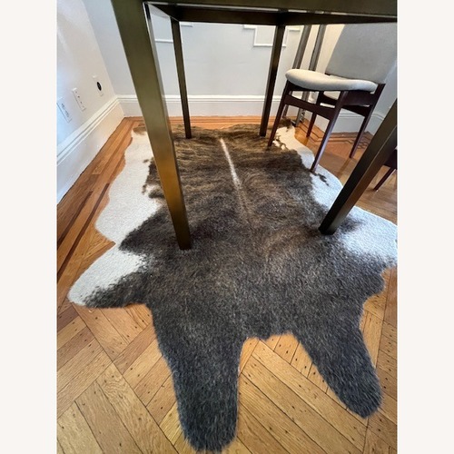 Used Overstock Cowhide Area Rug 5' x 6.8' for sale on AptDeco