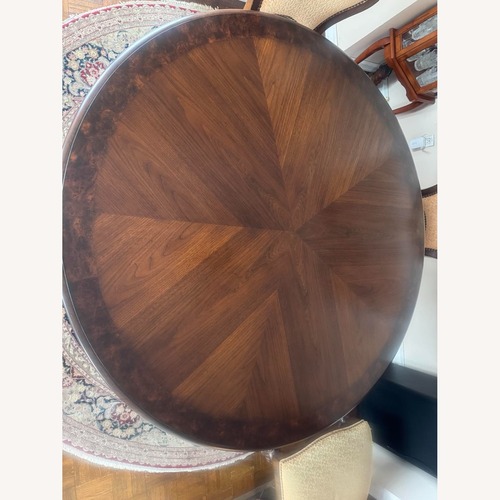 Used Dark Brown Wood Dining Table for sale on AptDeco
