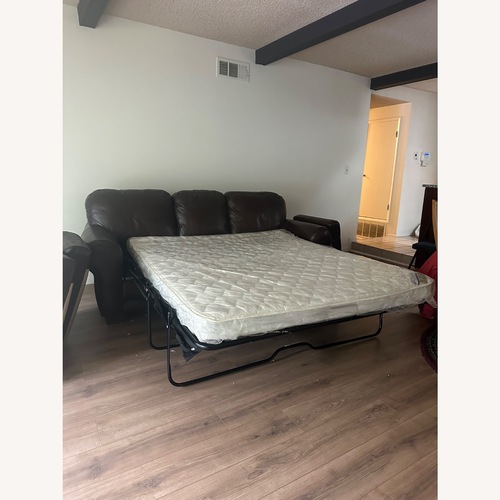 Used La-Z-Boy Dark Brown Leather Sleeper Sofa for sale on AptDeco