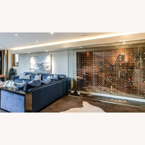 Used STACT Walnut Designer 504-Bottle Wine Wall for sale on AptDeco