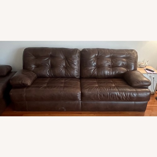 Used Ashley Furniture Dark Brown Leather 2 Seater Sofa for sale on AptDeco
