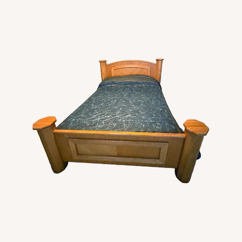 Used Light Brown Wood Queen Bed for sale on AptDeco