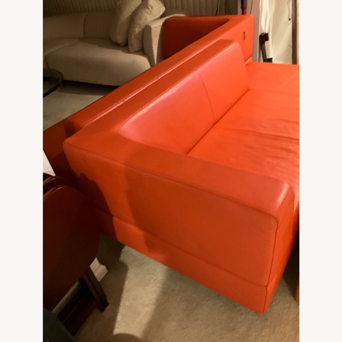 Used Orange Leather 2 Piece Sectional for sale on AptDeco
