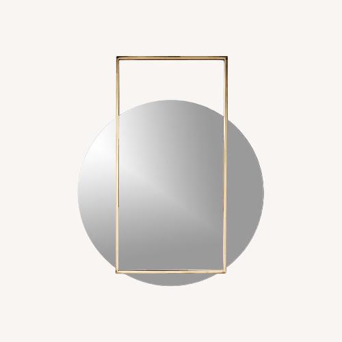 Used CB2 Pendulum Gold Round Wall Mirror 32"×40" for sale on AptDeco