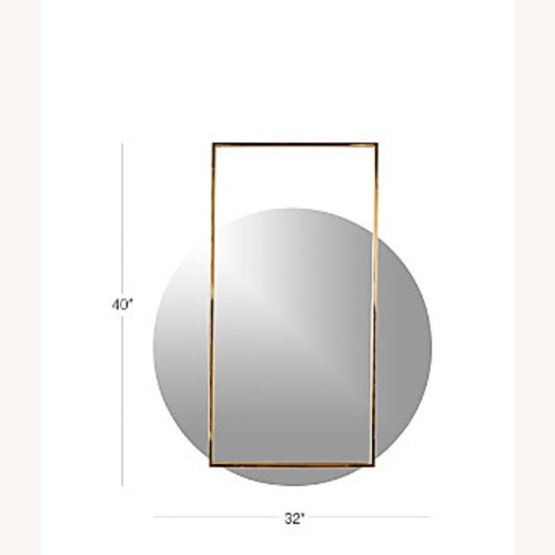 Used CB2 Pendulum Gold Round Wall Mirror 32"×40" for sale on AptDeco