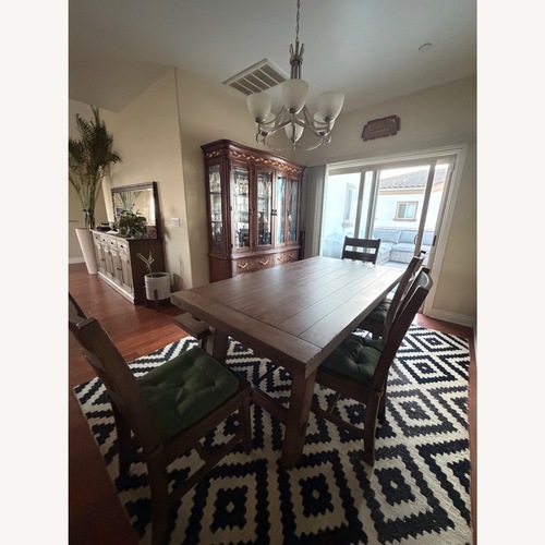 Used Natural Wood Dining Set for sale on AptDeco