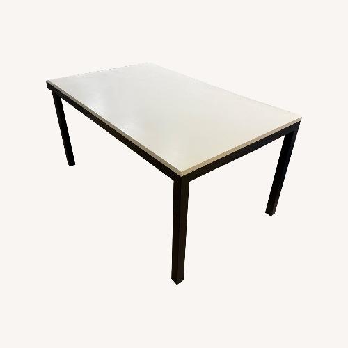 Used Crate & Barrel Parsons White Wood Dining Table for sale on AptDeco