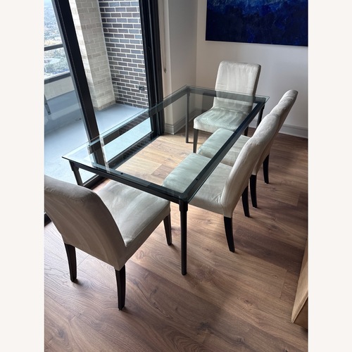 Used West Elm Glass Dining Table for sale on AptDeco