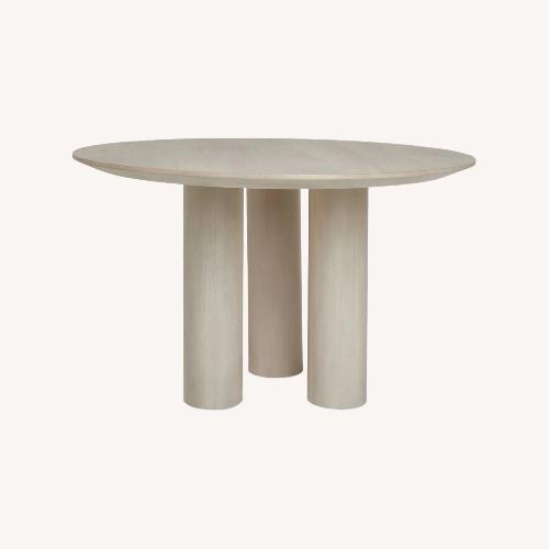 Used Lulu & Georgia Natural Wood Dining Table for sale on AptDeco