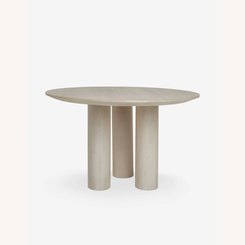 Used Lulu & Georgia Natural Wood Dining Table for sale on AptDeco