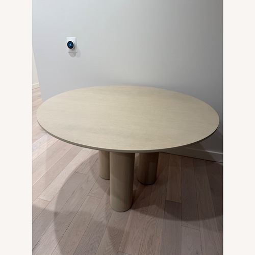 Used Lulu & Georgia Natural Wood Dining Table for sale on AptDeco