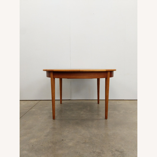 Used Vintage Mid Century Teak Extendable Dining Table for sale on AptDeco