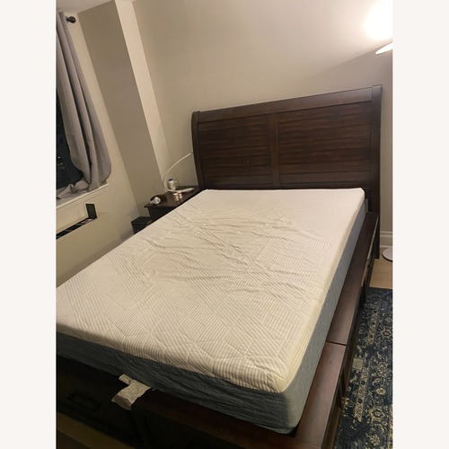 Used Bob's Discount Furniture Dark Brown Queen Bed for sale on AptDeco