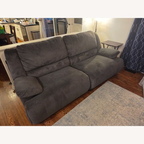 Used Ashley Furniture Dark Gray Fabric 2 Seater Sofa for sale on AptDeco