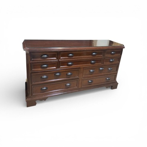 Used Bassett Solid Wood 10-Drawer w/ Glass Top Dresser for sale on AptDeco