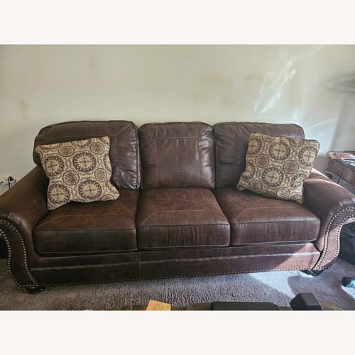 Used Dark Brown Leather 3+ Piece Sectional for sale on AptDeco