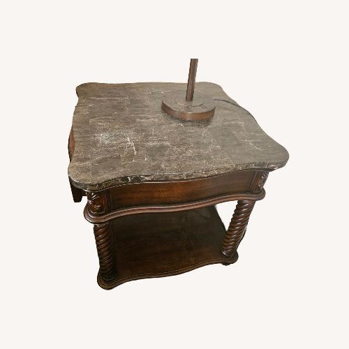 Used Raymour & Flanigan Dark Brown Coffee Table for sale on AptDeco