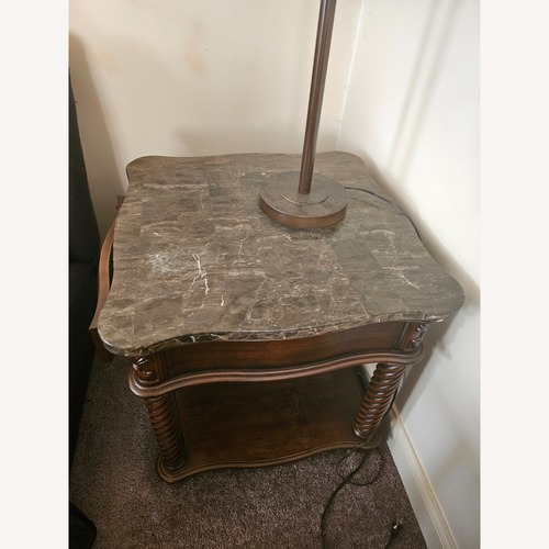 Used Raymour & Flanigan Dark Brown Coffee Table for sale on AptDeco