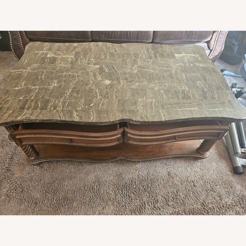 Used Dark Brown Wood Coffee Table for sale on AptDeco