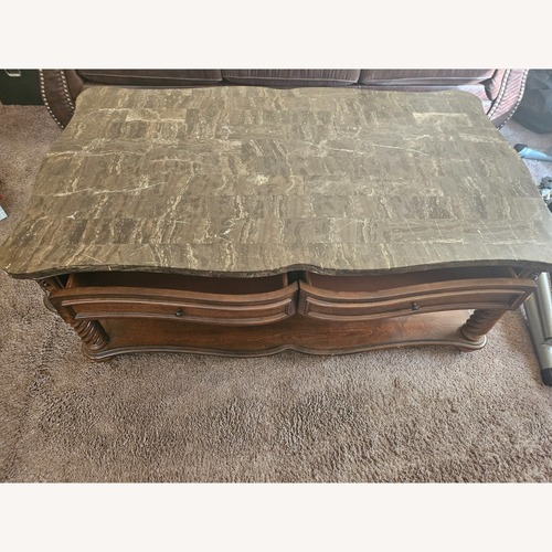 Used Dark Brown Wood Coffee Table for sale on AptDeco