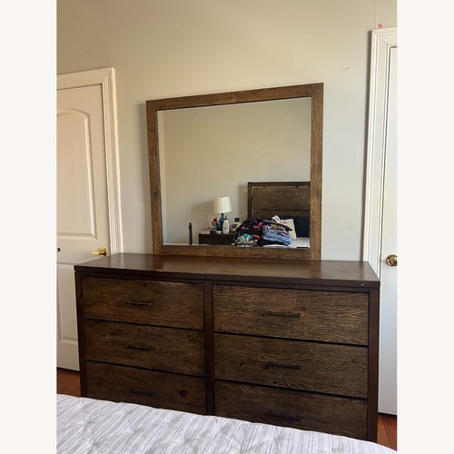 Used Raymour & Flanigan Larkspur Dark Brown Wood Dresser for sale on AptDeco