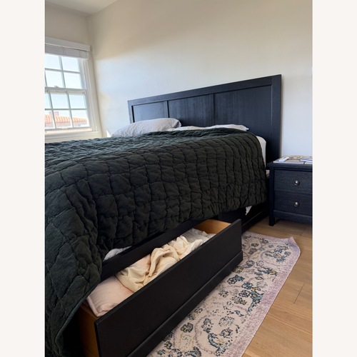 Used Pottery Barn Tacoma Black Wood King Storage Bed for sale on AptDeco