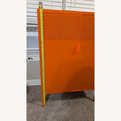 Used Amazon Orange Metal Armoire for sale on AptDeco